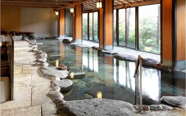 Sagasawakan ryokan indoors rock bed onsen