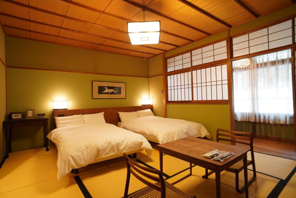 Arima Onsen Tocen Goshobo tatami floors with western beds