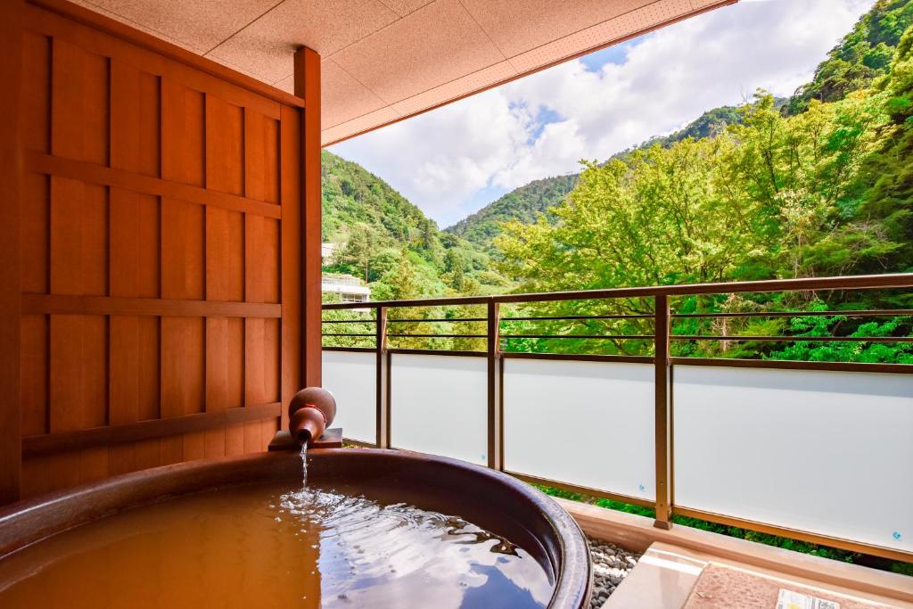 Okuno Hosomichi private onsen with forest views