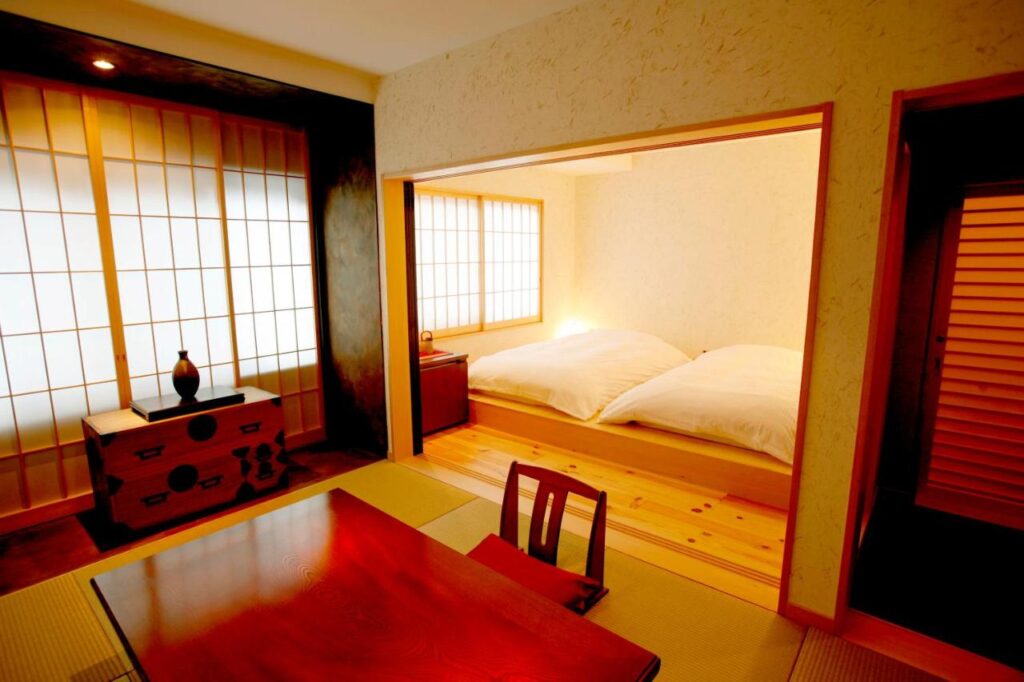 Masutomi Ryokan modern room with wooden and tatami floors