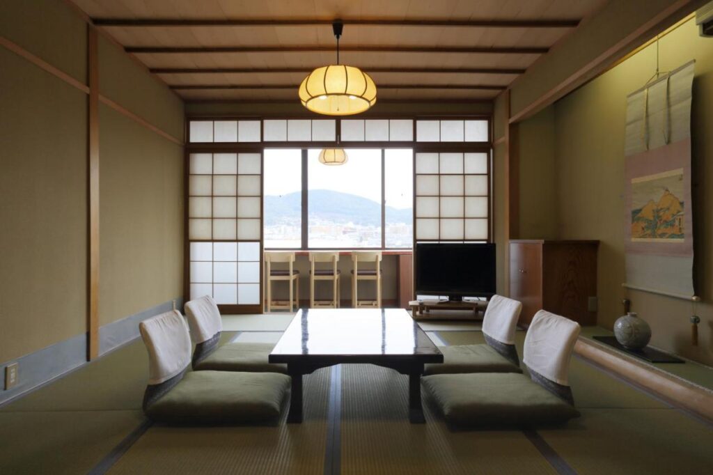 Tazuru Ryokan room with views of Kyoto mountains