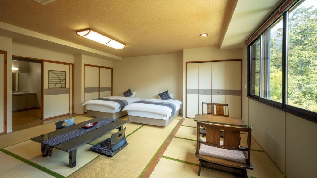Atsushio Onsen Yamagataya Hotel Tatami Room Beds