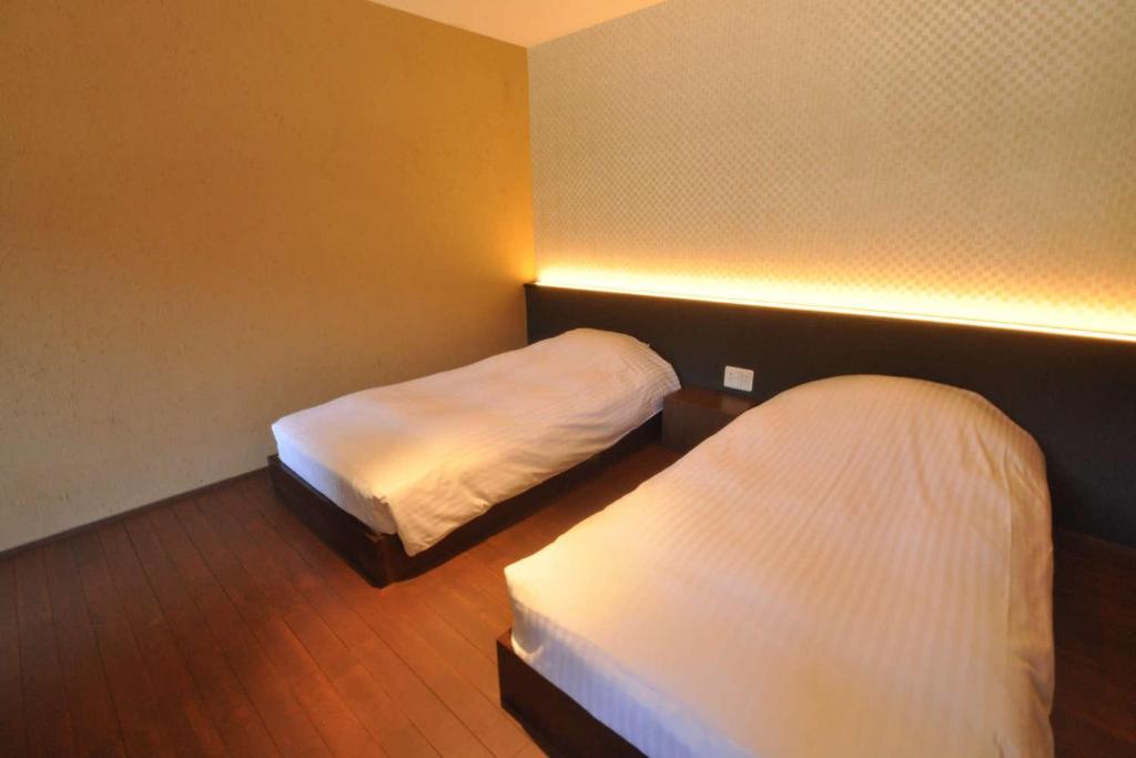 Aura Tachibana Twin Bed Room