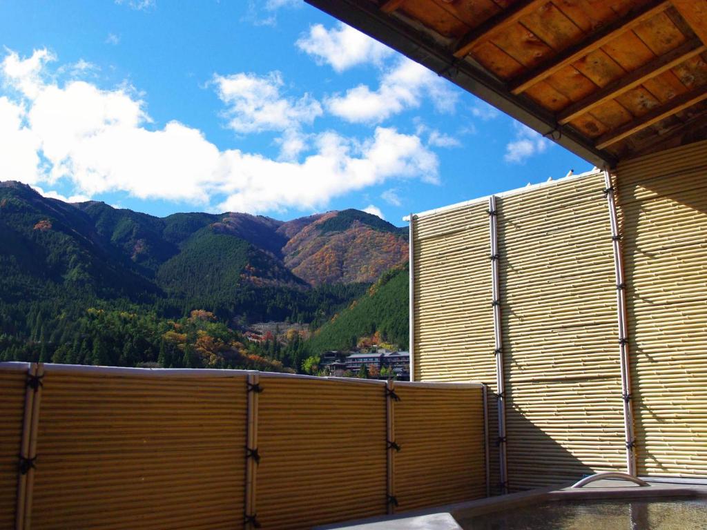 Fugaku Onsen Ryokan Outdoor Bath Mountain View