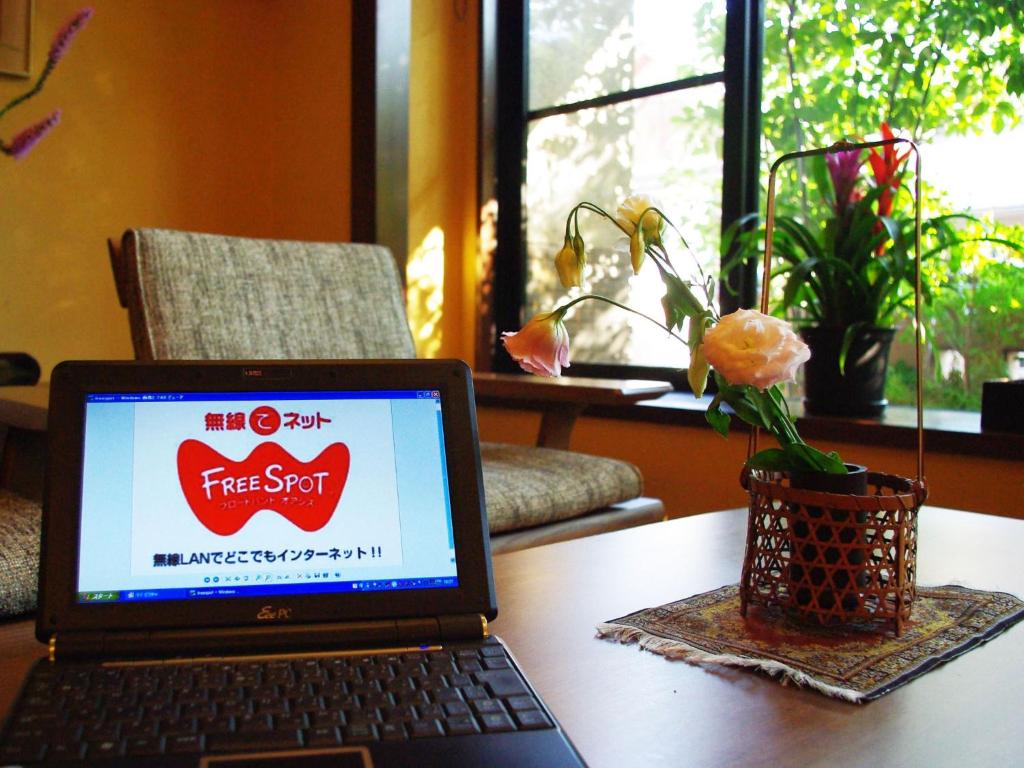 Fugaku Onsen Ryokan Room Laptop Flower