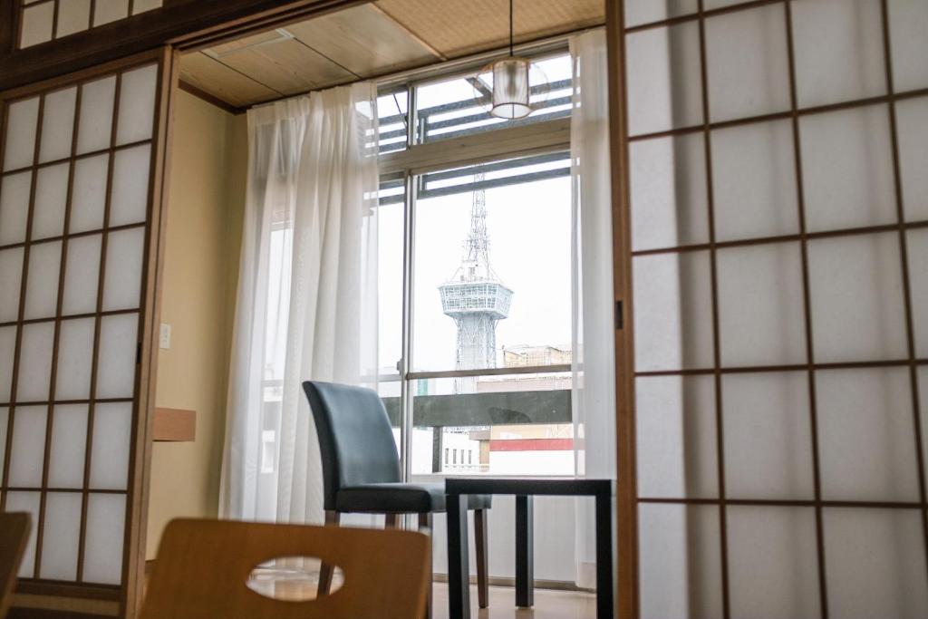 Guest House Sunline Beppu Shoji Doors Tower View