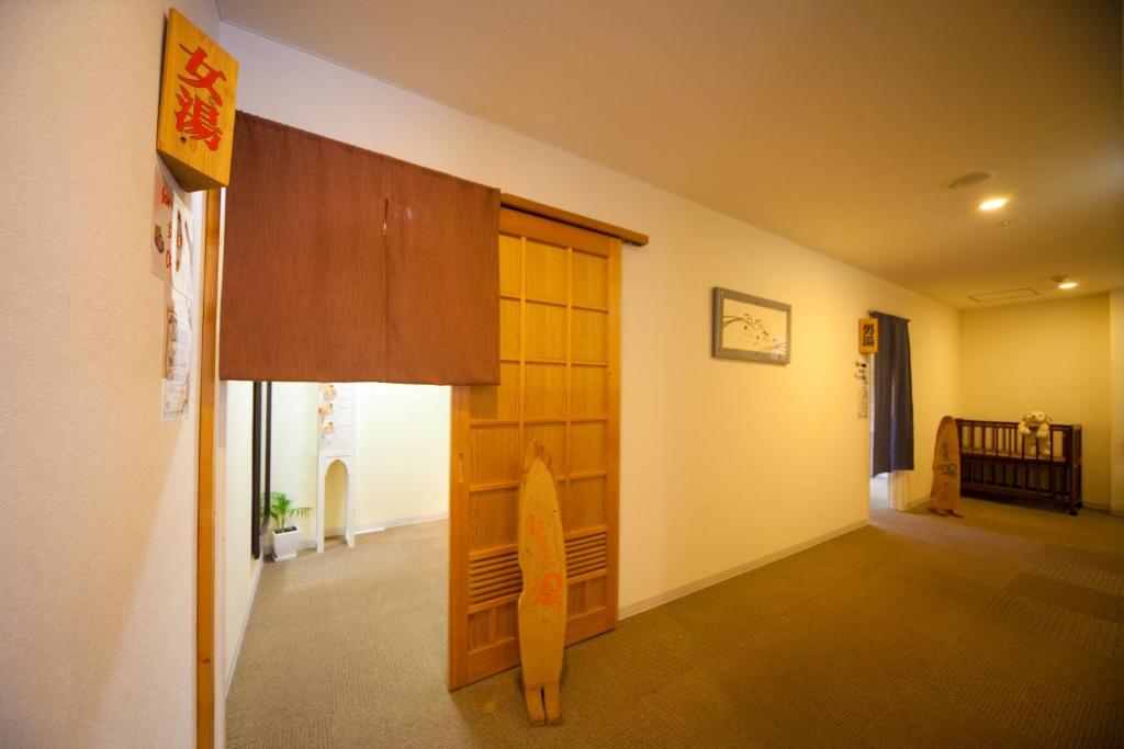 Hotel Aile Wooden Door Hallway