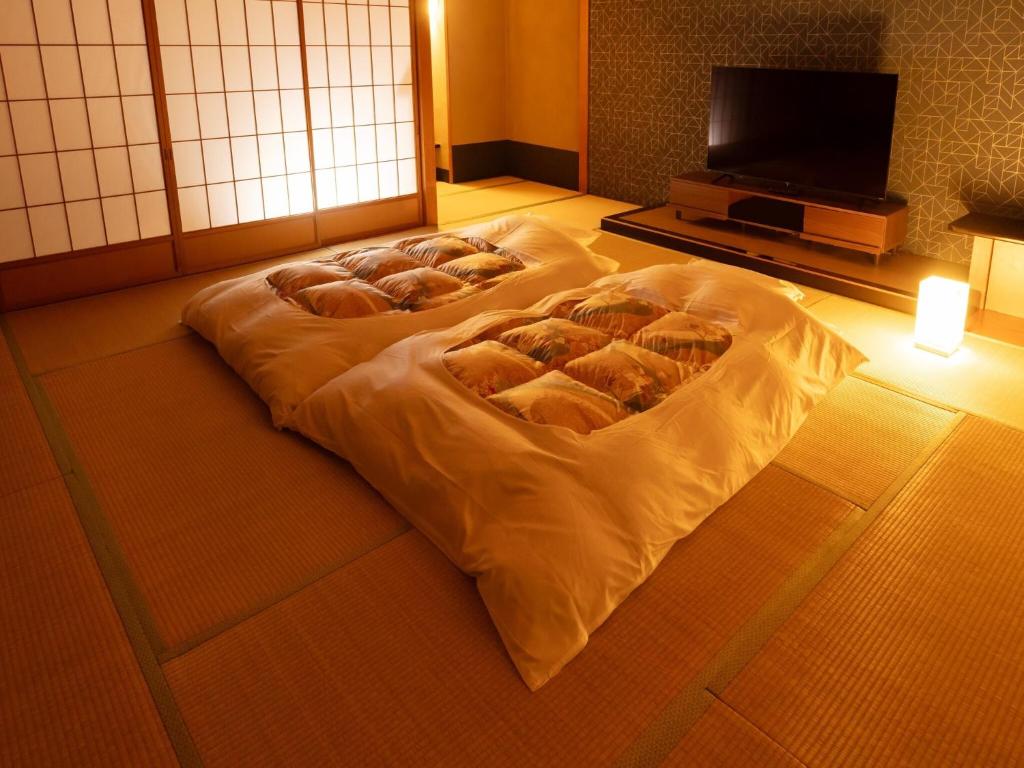 Hotel New Ginsui Tatami Futon Tv