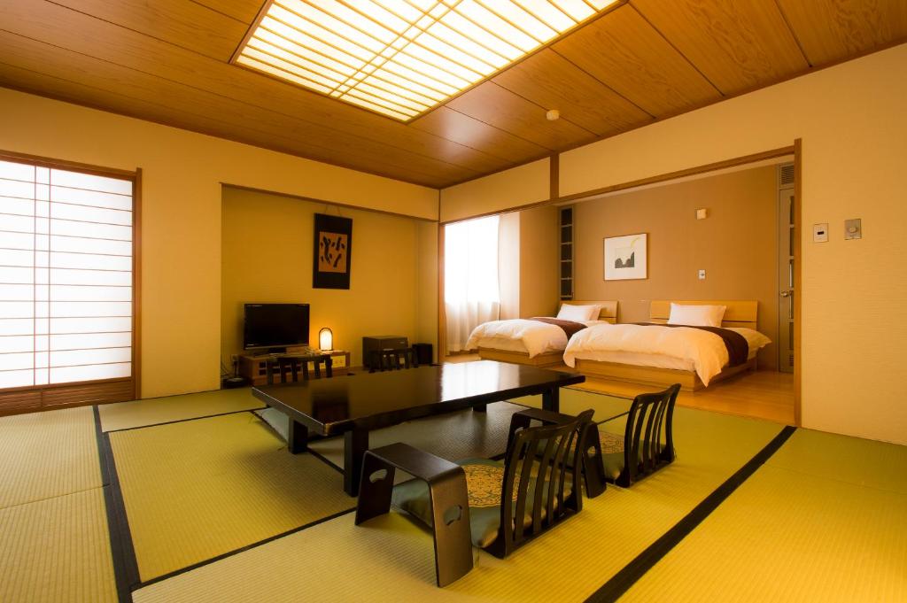 Hotel Shiragiku Tatami Room Dining Area Beds