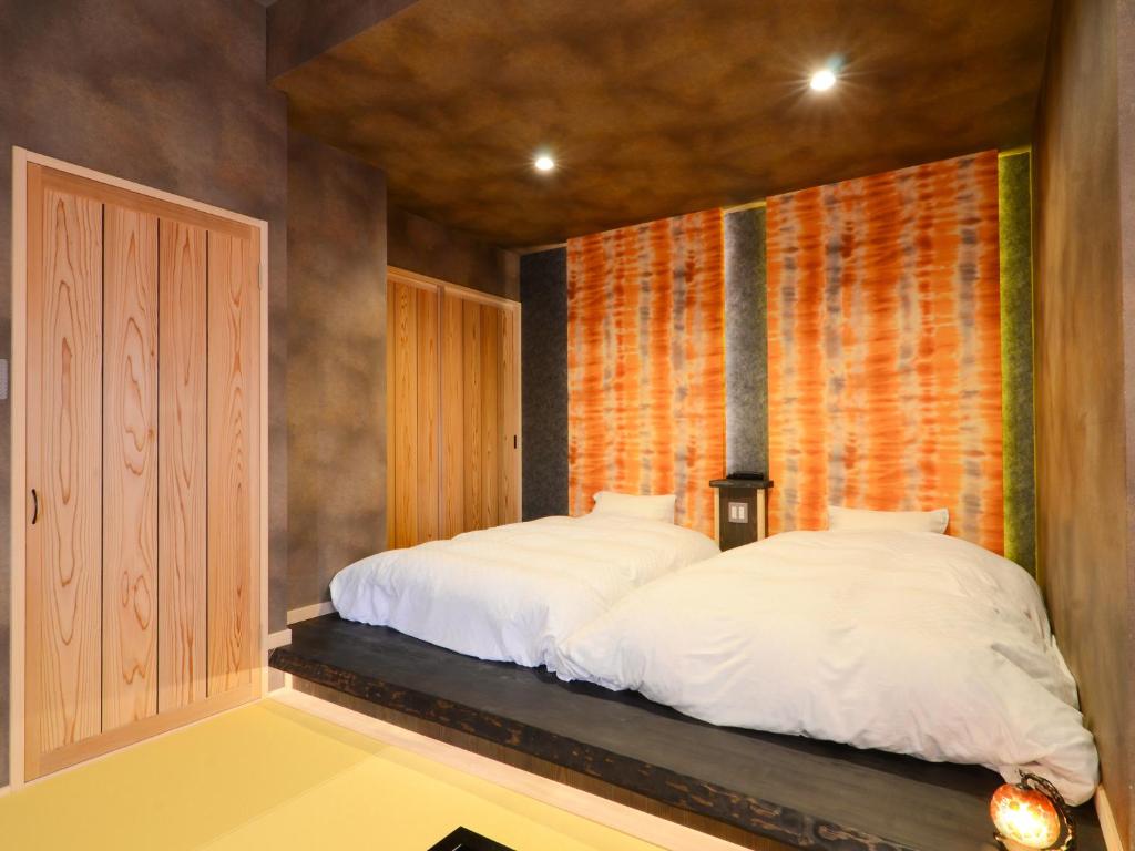 Nihon Ryokan Utsuwa Beppukannawa Bedroom