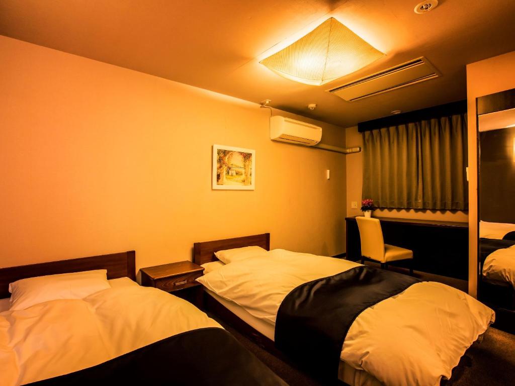 Oedo Onsen Gero Annex Twin Bed Room