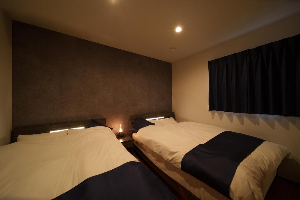 Sanwa Izumi Twin Bed Room
