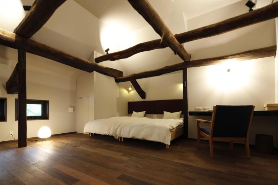 Satoyama Jujo The House Izumi Wooden Beam Bedroom