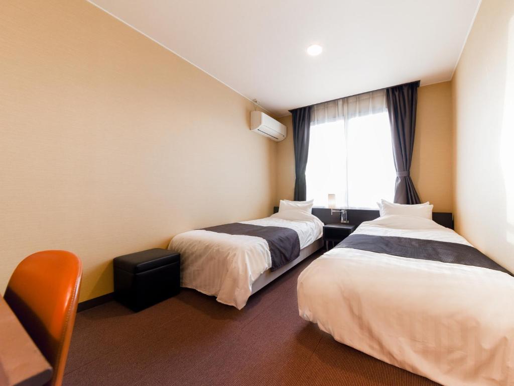 Tanegashima Araki Hotel Twin Bed Room