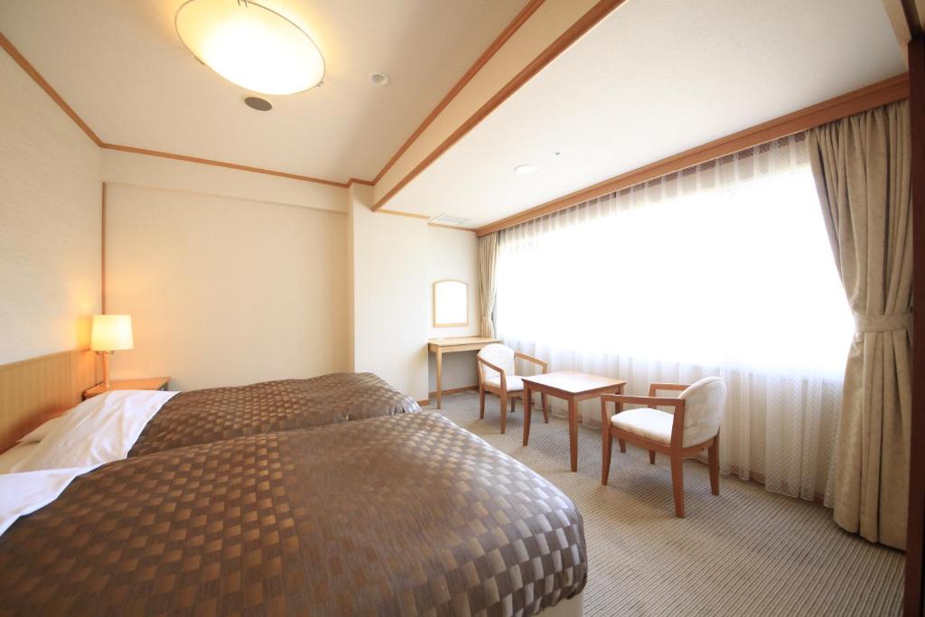 Heiseikan Shiosaitei Twin Bed Room