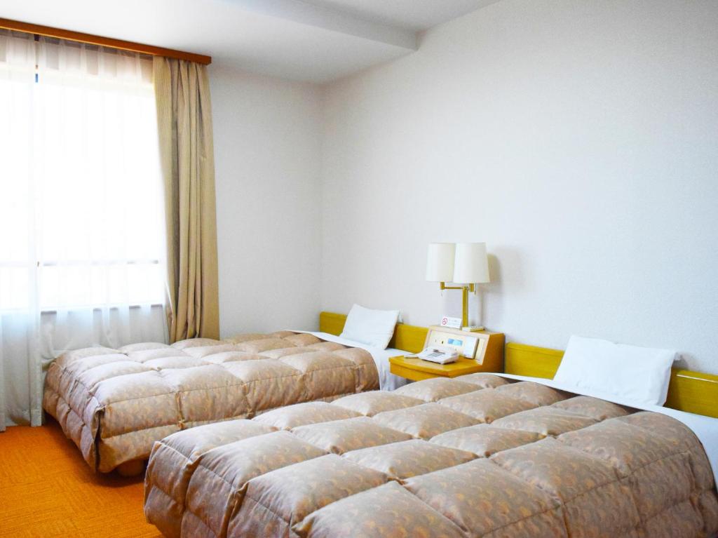 Hotel Gyokusen Twin Bed Room