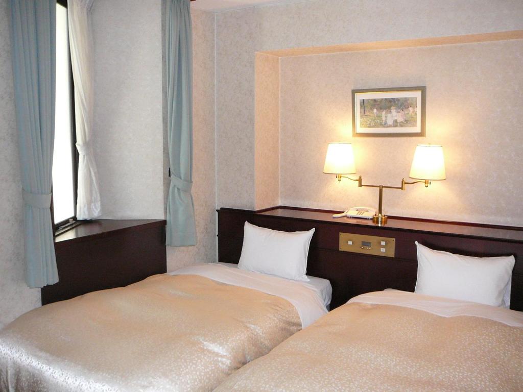 Hotel Hanakomichi Twin Bed Room