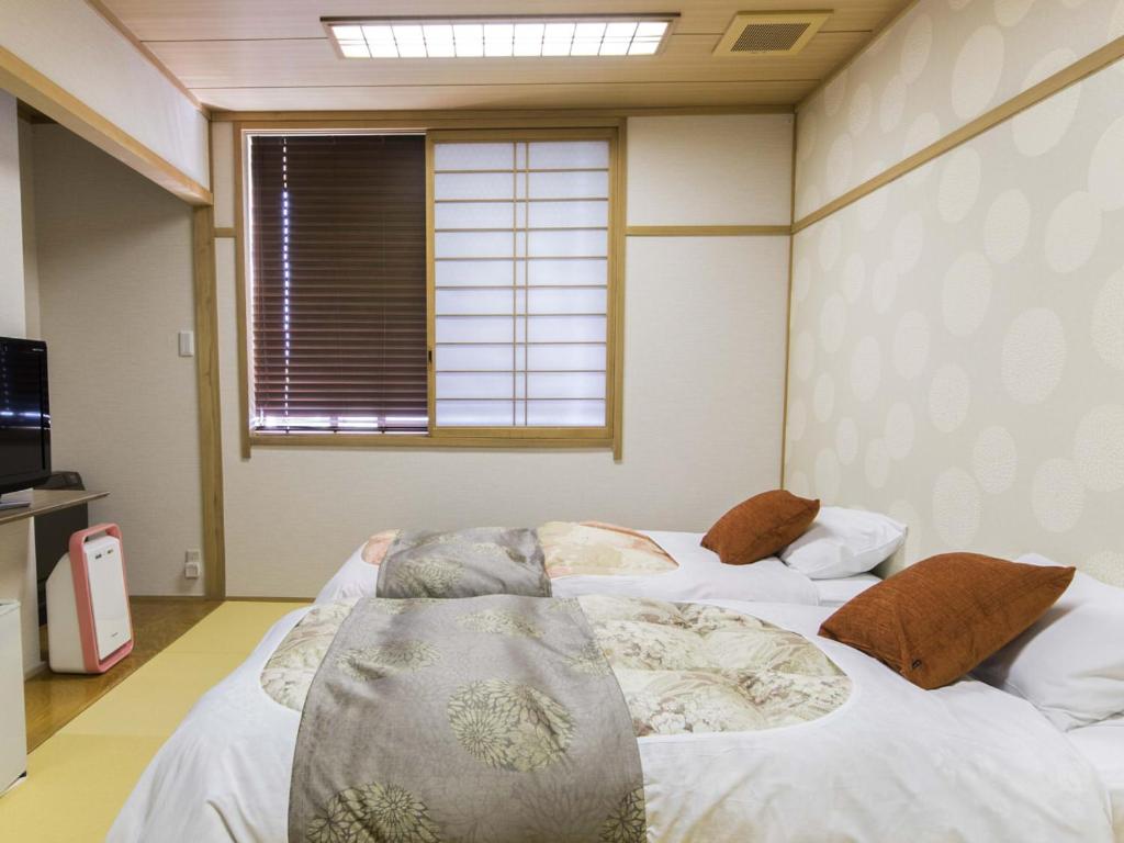 Hotel Katsuragi Bedroom Shoji Window