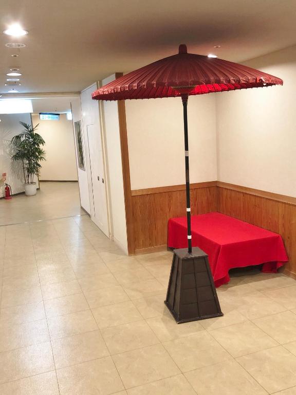 Hotel Nagisaya Hallway Red Umbrella