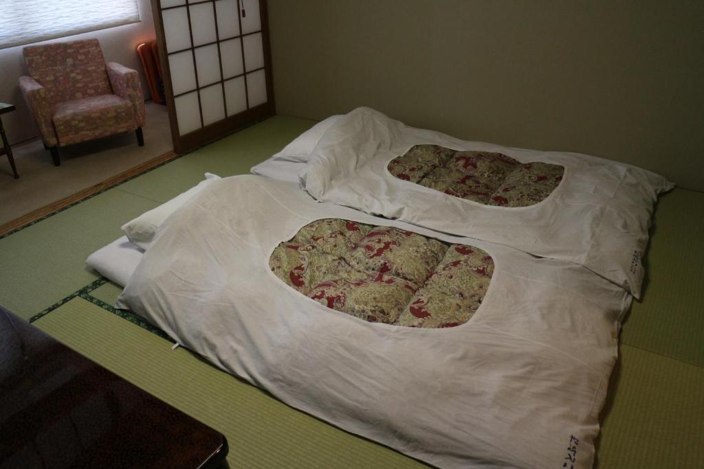Hotel New Kotobuki Futon Tatami Room