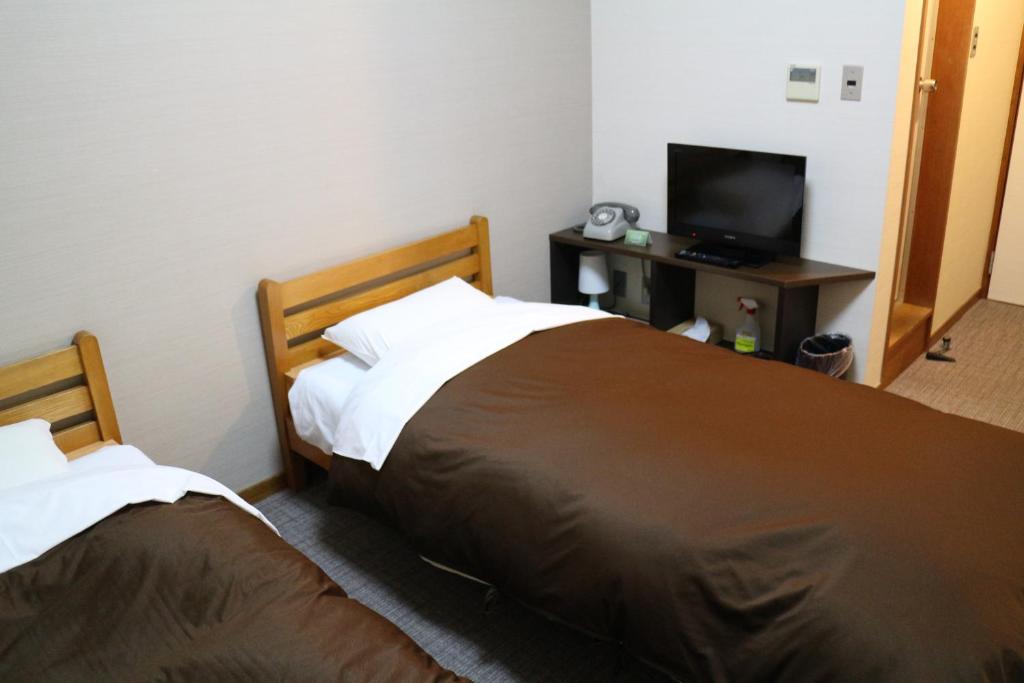 Hotel New Kotobuki Twin Bed Room