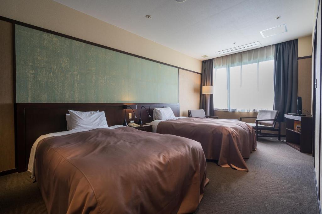 Hotel Ryutoen Twin Beds Room