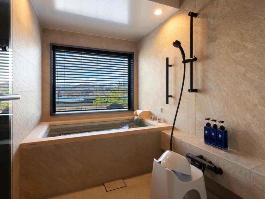 Hotel Shion Private Onsen Bathroom