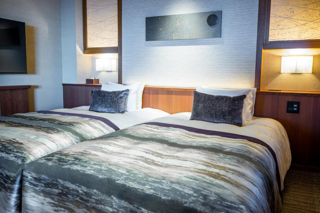 Hoteloosado Twin Bed Room