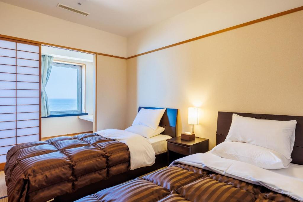 Hoteloosado Twin Room Ocean View