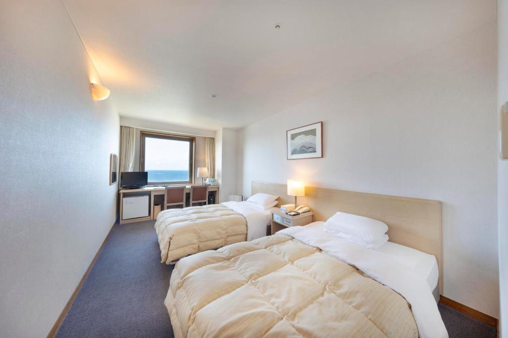 Hoteloosado Twinbedroom Seaview