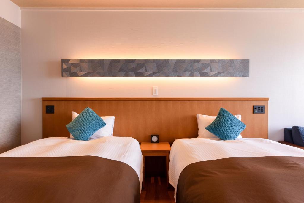 Kaikeseasidehotel Twinbeds Room