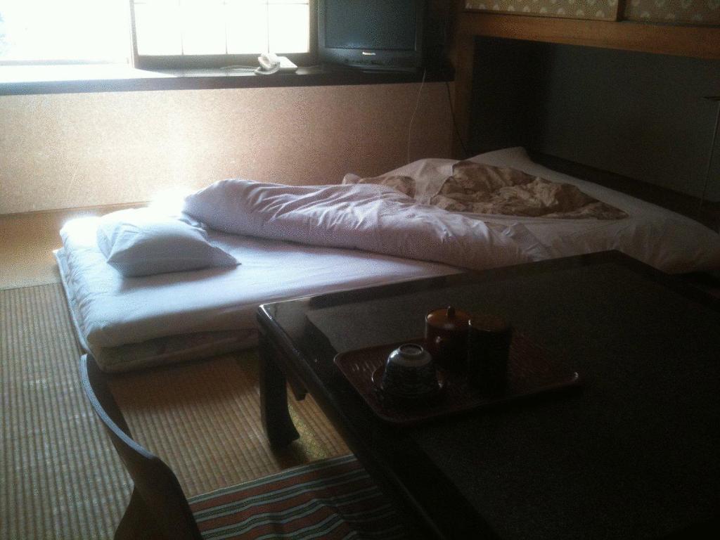 Kamesei Ryokan Futon Room