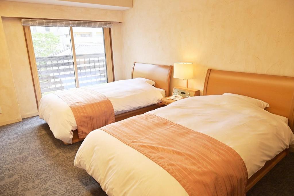 Kansuitei Kozeniya Twin Bed Room