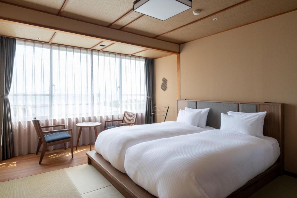 Koran No Yu Kinko Ro Twin Bed Room