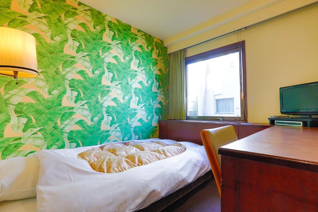 Los Inn Bedside Tropical Wallpaper