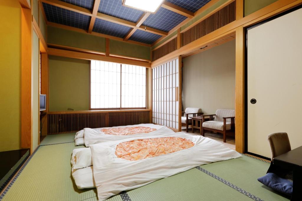 Okada Ryokan Warakutei Tatami Room Futons