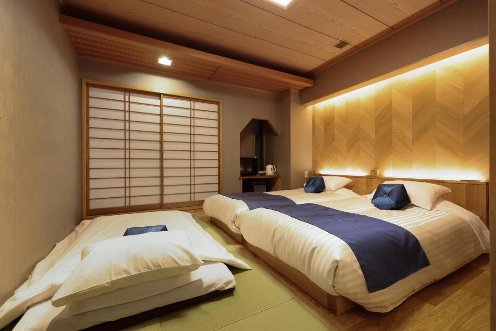 Ryokan Asakusa Shigetsu Bedroom With Futon And Beds