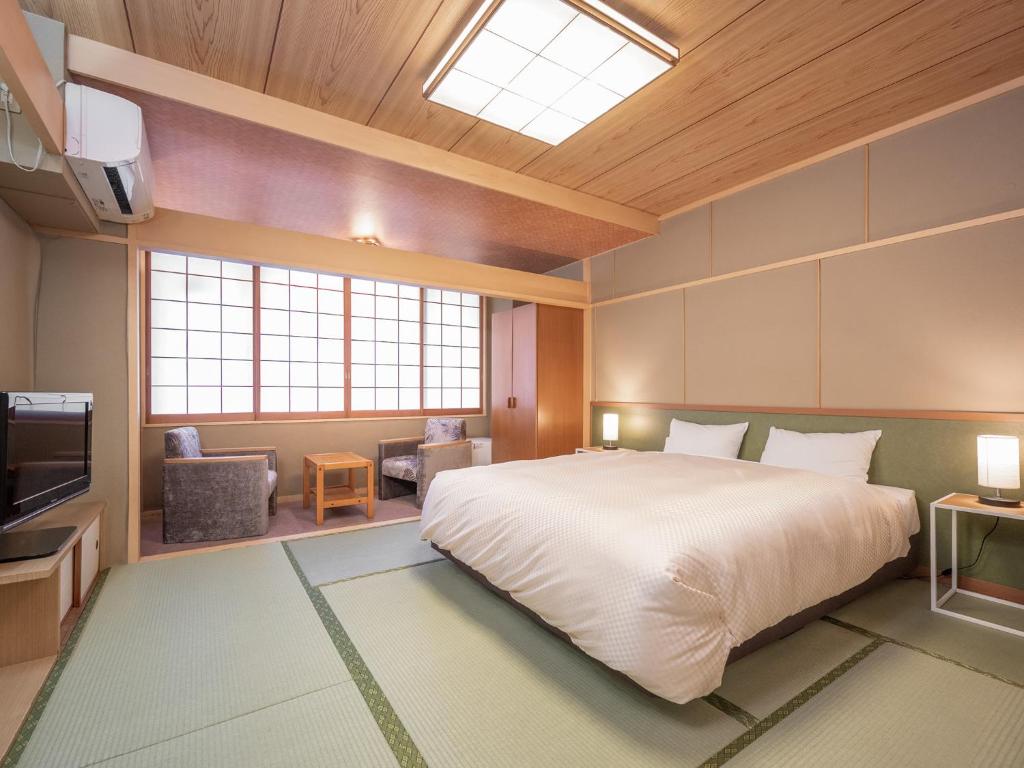 Yumoto Kanko Hotel Saikyo Tatami Room Bed