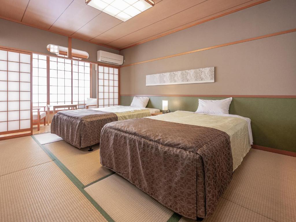 Yumoto Kanko Hotel Saikyo Tatami Room Beds
