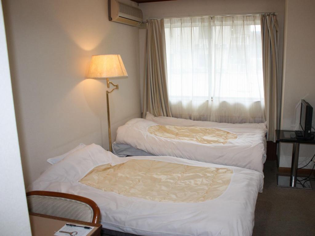 Yamamura Bekkan Twin Bed Room