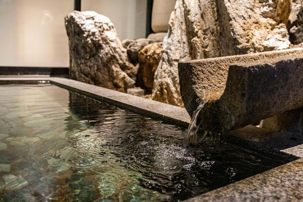 Kinosaki Onsen Shinzan Rotenburo Stone Water