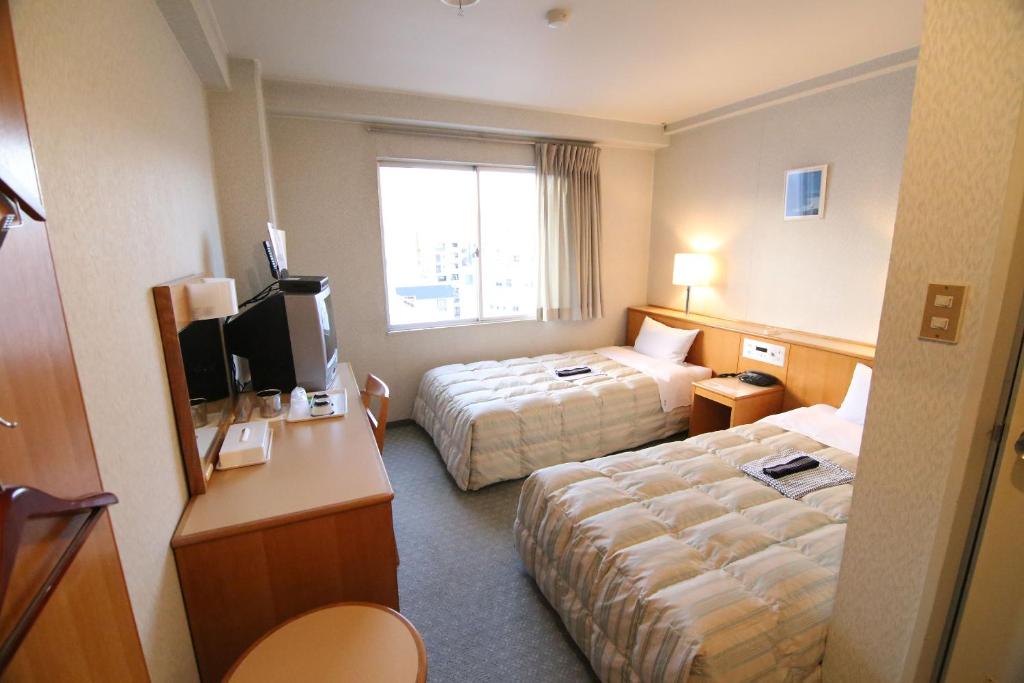 South Breeze Hotel Kochi Kaigetsu Twin Bed Room