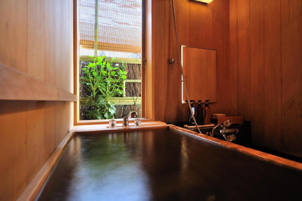 Tsukioka Hotel Onsen Bathroom