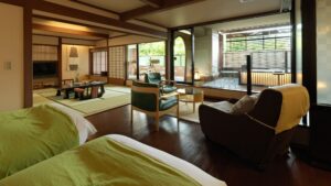 Guest room with sitting area and tatami space