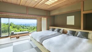Tatami guest room with two beds and window view
