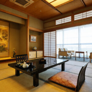 Habitación de tatami con mesa baja y cojines en el suelo