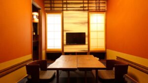 Tatami room seating area with low table and chairs