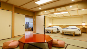 Tatami room with low table and twin beds