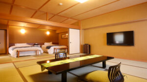 Tatami room with low table and twin beds
