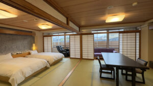 Tatami guest room with twin beds and table